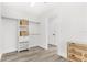 Bright walk-in closet with custom shelving and a neutral color scheme at 380 Colony Point S Rd, St Petersburg, FL 33705
