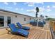 Outdoor deck with lounge chairs and patio furniture, perfect for relaxing at 380 Colony Point S Rd, St Petersburg, FL 33705