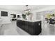 Large kitchen island provides ample space and seamless transition to dining and living, great for entertaining at 380 Colony Point S Rd, St Petersburg, FL 33705