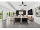 Bright living room with comfortable seating, modern decor, and a view of the backyard at 380 Colony Point S Rd, St Petersburg, FL 33705