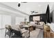 Comfortable living room with a large sectional sofa and stylish decor at 380 Colony Point S Rd, St Petersburg, FL 33705