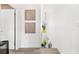 Modern staircase featuring a wood banister, neutral walls, and wood-look flooring at 380 Colony Point S Rd, St Petersburg, FL 33705