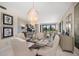 Bright and airy dining room with views of the golf course at 4 Belleview Blvd # 305, Belleair, FL 33756