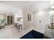 Inviting foyer and breakfast bar seating, showcasing elegant tile flooring and bright, neutral decor at 4 Belleview Blvd # 305, Belleair, FL 33756
