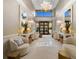 Beautiful lobby entrance featuring elegant seating areas, neutral tones, and ample natural light at 4 Belleview Blvd # 305, Belleair, FL 33756