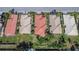 High-angle view showcasing a neighborhood's layout with neatly arranged homes and green spaces in Florida at 4415 Muirfiled Dr, Bradenton, FL 34210