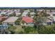 Charming single-story home with a red tile roof and lush landscaping in a desirable neighborhood at 4415 Muirfiled Dr, Bradenton, FL 34210