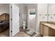 The primary bathroom features a vanity, shower, toilet, and direct access from the bedroom at 4511 Preston Woods Dr, Valrico, FL 33596