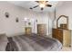 Vaulted ceiling in the bedroom, plus a view into the primary ensuite bathroom at 4511 Preston Woods Dr, Valrico, FL 33596