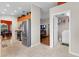 Modern kitchen featuring stainless steel appliances, stone floors, and adjacent dining and laundry areas at 4511 Preston Woods Dr, Valrico, FL 33596