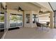 Covered patio boasts dual ceiling fans and views of the pool area at 4511 Preston Woods Dr, Valrico, FL 33596