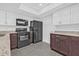 Bright kitchen featuring stainless steel appliances, granite counters, and plenty of storage at 4532 Cedarwood Village Dr, Tampa, FL 33624