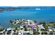 Breathtaking aerial view of the property with views of Sunshine Skyway and Isla Del Sol at 4735 Baywood Point S Dr, Gulfport, FL 33711