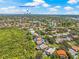Aerial view of the homes in a neighborhood with the city of St. Pete in the distance at 5270 White Sand Ne Cir, St Petersburg, FL 33703