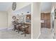 Kitchen bar features elegant pendant lighting, and a seamless design that flows into the kitchen at 5270 White Sand Ne Cir, St Petersburg, FL 33703