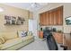 Cozy office featuring built-in cabinetry, comfortable seating, and neutral walls for a productive workspace at 5270 White Sand Ne Cir, St Petersburg, FL 33703