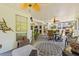 Spacious screened patio with comfortable seating, ceiling fans and multiple access points to the main house at 5270 White Sand Ne Cir, St Petersburg, FL 33703