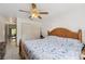 Comfortable bedroom with closet and a ceiling fan with light fixture at 6209 S Harold Ave, Tampa, FL 33616