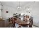Bright dining room featuring decorative light fixture and neutral paint at 6209 S Harold Ave, Tampa, FL 33616