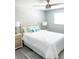 Comfortable bedroom with ceiling fan, modern decor and a serene atmosphere at 690 Fox St, Longboat Key, FL 34228