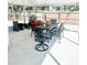 Inviting screened-in patio with outdoor dining and seating area, ideal for relaxation and entertaining at 690 Fox St, Longboat Key, FL 34228