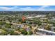 An aerial view displays its proximity to businesses, the canal, and other residential properties at 762 77Th N Ave, St Petersburg, FL 33702