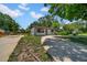 Charming single-story home with a well-kept lawn and a spacious driveway at 762 77Th N Ave, St Petersburg, FL 33702