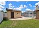 View of backyard shed next to the enclosed pool with patio at 8306 N Gomez Ave, Tampa, FL 33614