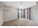 Neutral bedroom with carpet, ceiling fan and closet at 8306 N Gomez Ave, Tampa, FL 33614