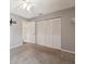 Bedroom featuring neutral carpet, ceiling fan, and closet at 8306 N Gomez Ave, Tampa, FL 33614