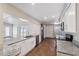 Modern kitchen boasts granite countertops and stainless steel appliances at 8306 N Gomez Ave, Tampa, FL 33614