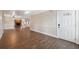 Open-concept living room featuring elegant tile flooring and plenty of natural light at 8306 N Gomez Ave, Tampa, FL 33614
