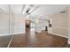 Spacious open concept living room with stylish lighting, dining, and kitchen areas at 8306 N Gomez Ave, Tampa, FL 33614
