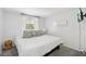 This bedroom is bright and airy, offering plenty of natural light and a modern decor at 8500 144Th Ln, Seminole, FL 33776