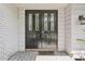 Close up of a black double front door with decorative glass inserts and a 'Welcome' mat at 8500 144Th Ln, Seminole, FL 33776