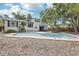 An inviting backyard and pool provides a perfect outdoor retreat with a lovely setting at 8500 144Th Ln, Seminole, FL 33776