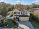 An aerial perspective of a well-maintained home in a lovely neighborhood at 8607 Tidal Breeze Dr, Riverview, FL 33569
