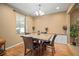 Dining room featuring a table with seating for four and hardwood flooring at 8607 Tidal Breeze Dr, Riverview, FL 33569
