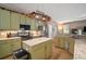 Kitchen featuring an island, stainless steel appliances, and granite countertops at 8607 Tidal Breeze Dr, Riverview, FL 33569