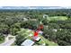 This aerial view captures the property nestled in a lush green neighborhood, a serene setting at 9413 Forest Hills Dr, Tampa, FL 33612