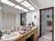 Large bathroom with dual sinks, a vanity area, and plenty of storage at 950 Waverly St, Oldsmar, FL 34677
