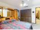 Comfortable bedroom features ample closet space, ceiling fan, and a cozy, inviting atmosphere at 950 Waverly St, Oldsmar, FL 34677