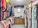 Walk-in closet with built-in shelving and ample storage for clothing and accessories at 950 Waverly St, Oldsmar, FL 34677