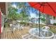 Expansive back deck overlooking a tranquil canal, perfect for entertaining or relaxing by the water at 10732 Drummond Rd, Tampa, FL 33615
