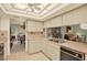 Bright kitchen featuring tile floors, and stainless steel appliances at 10732 Drummond Rd, Tampa, FL 33615