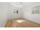 Bright bedroom featuring windows and hardwood floors at 1084 39Th Ne Ave, St Petersburg, FL 33703
