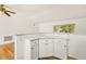 Bright kitchen with bar seating and corner cabinets at 1084 39Th Ne Ave, St Petersburg, FL 33703