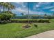 Landscaped Windward Pointe community entrance sign, providing a welcoming sense of arrival at 110 114Th Ne Ter # 110, St Petersburg, FL 33716