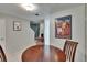 Cozy dining area with round table and chairs next to the stairs at 110 114Th Ne Ter # 110, St Petersburg, FL 33716