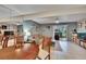 Inviting living room with tile flooring, ceiling fan, and sliding doors to patio at 110 114Th Ne Ter # 110, St Petersburg, FL 33716